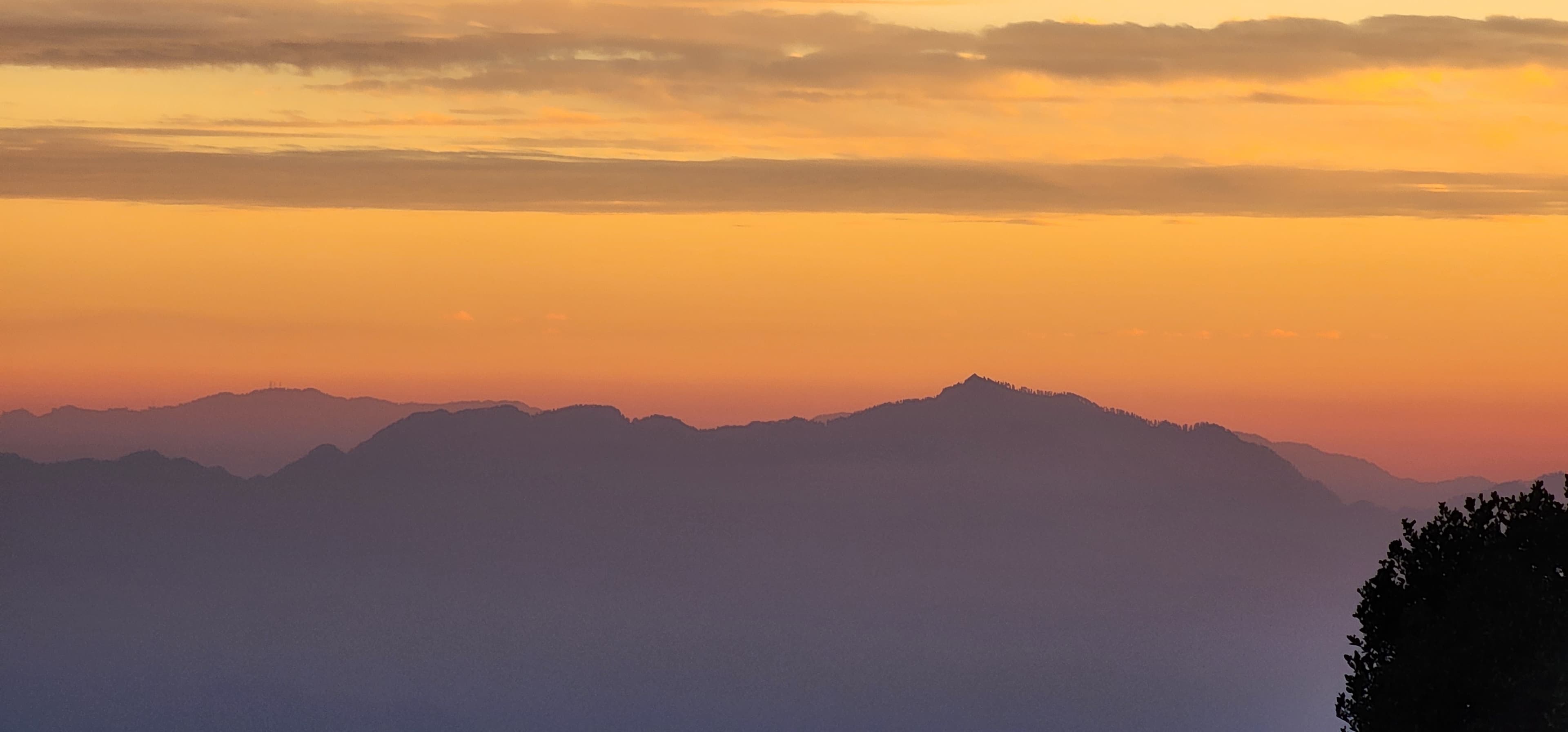 Warm sunset glow over Sajwar Valley