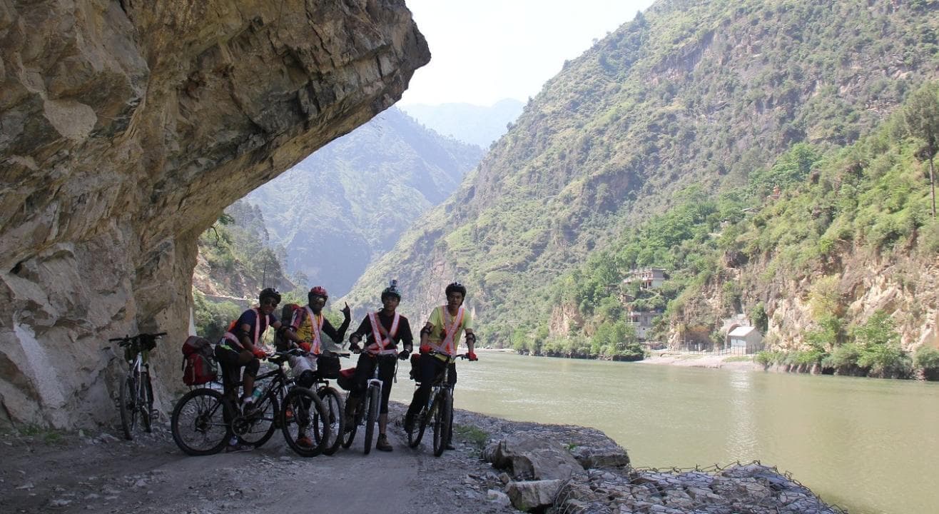 Group of bikers overlooking a valley