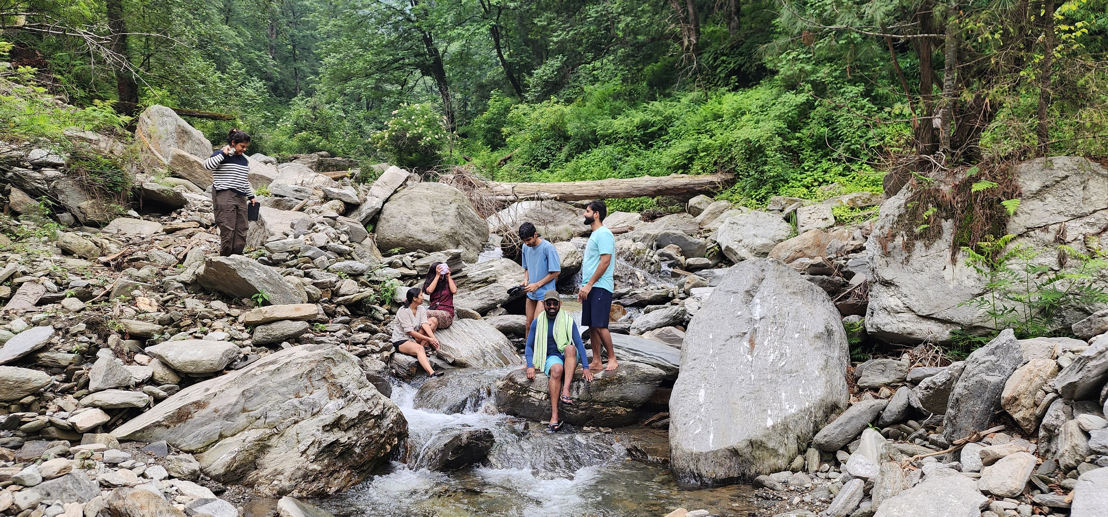 People enjoying a refreshing dip in the river near Ailyak