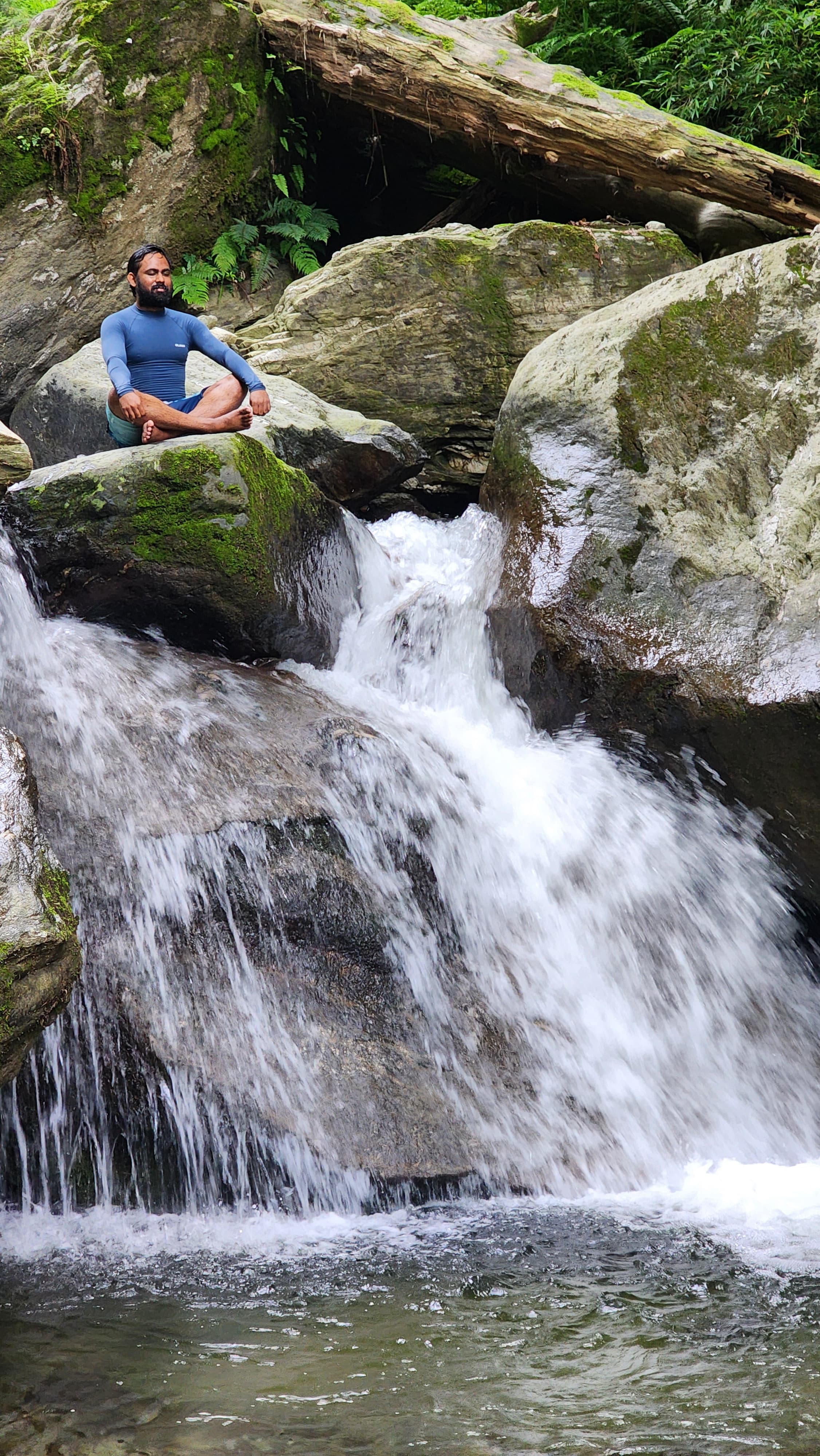 A traveler enjoying a peaceful water dipping session