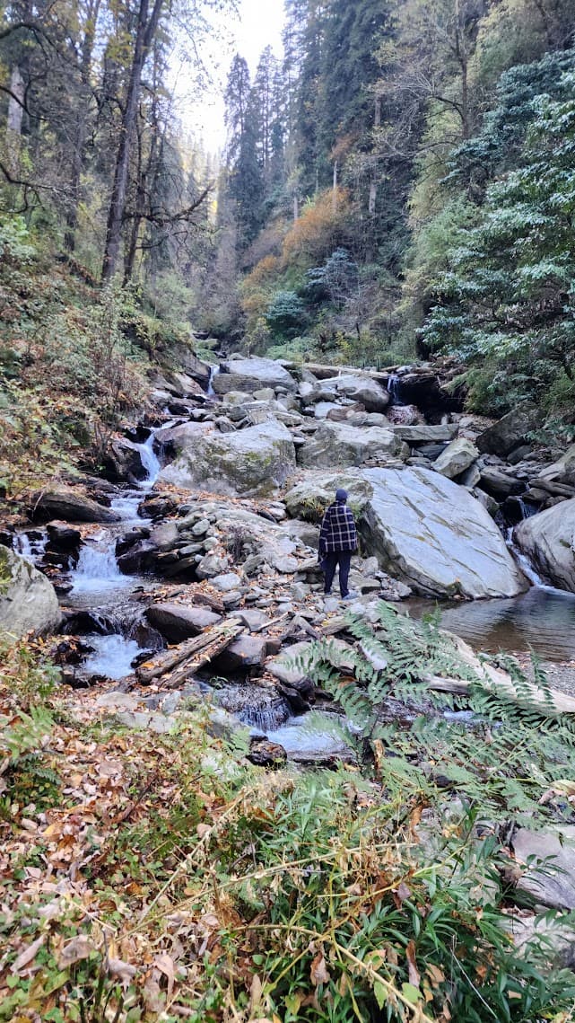 A hidden waterfall along the river walk